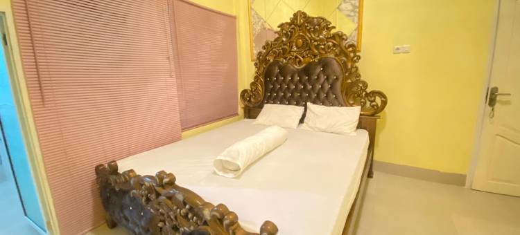 RN民宿-近竹子广场波勒瓦利-米特拉红门酒店(Homestay RN Near Taman Bambu Runcing Polewali Mitra RedDoorz)图片