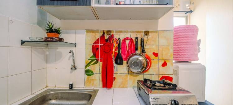 家庭般的紧凑型2BR Cibubur村公寓(Homey and Compact 2Br Cibubur Village Apartment)图片