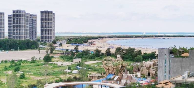 沐海·Homestay海景度假公寓(营口山海广场魔法温泉店)图片