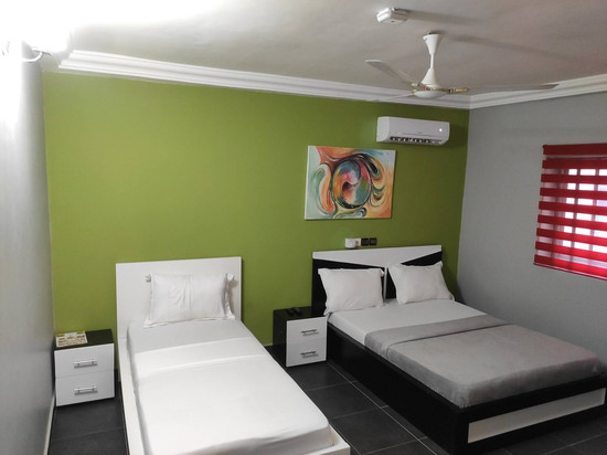 Deluxe Twin Beds in Royal Blue Guest House and Bar Lome
