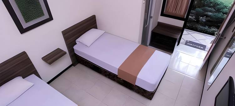 鲁马瓦希德伊斯兰旅馆(Guest House Rumah Wahidin Syariah)图片