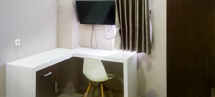 OYO1539阿姆里客房酒店(RedDoorz Syariah Near Sultan Syarif Kasim II Airport)图片