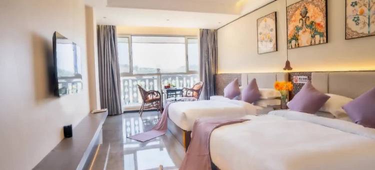 岩佤茶空间智能酒店(勐巴拉国际度假区沙河小镇店)图片