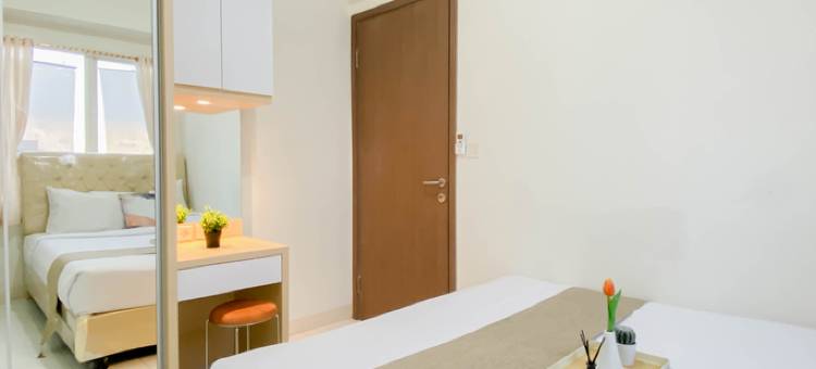 Nice and Warm 2BR at Podomoro Golf View Apartment By Travelio图片