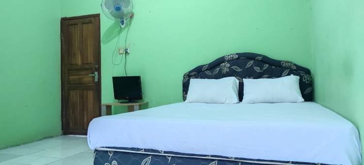 OYO 93411教法酒店托博朗(OYO 93411 Syariah Hotel Tomborang)图片