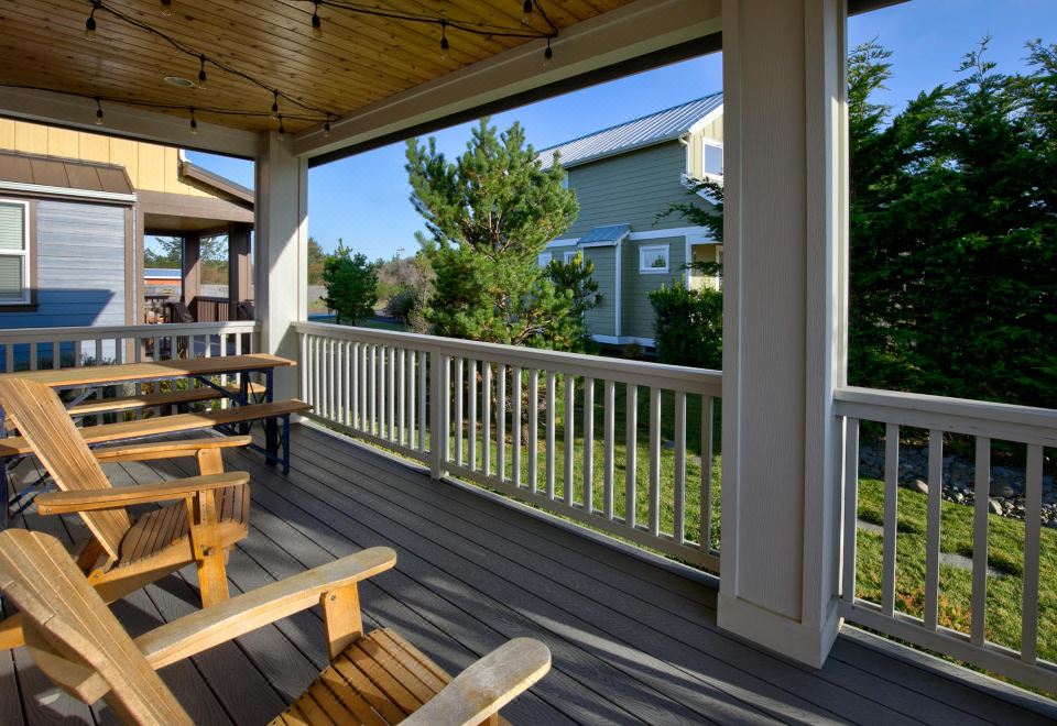 Open Concept Living and Back Porch Bliss - Charming Coastal Retreat Hotel Overview