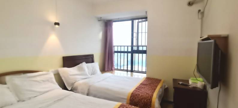 免费接车到袁家岗重医高档电梯公寓(步行街分店)图片