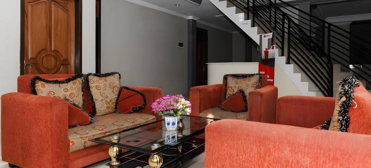 红多兹Plus酒店-近万鸦老凯拉吉杜亚特兰斯超市(RedDoorz Plus Near Transmart Kairagi Dua Manado)图片