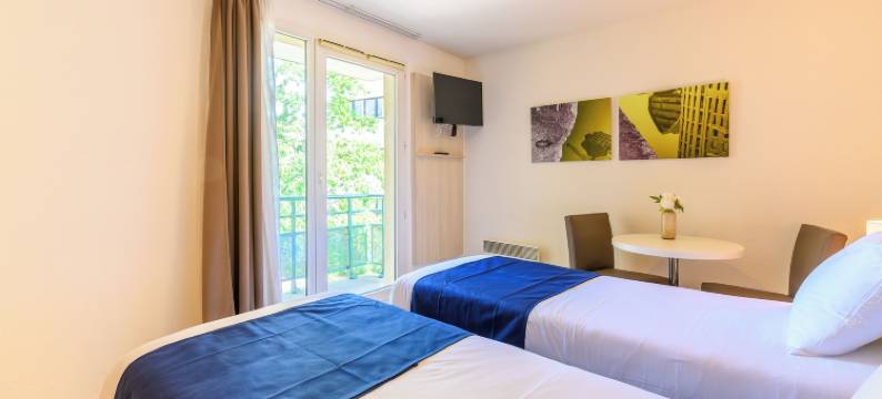 塞祖尔阿菲尔庞坦查尔斯戴高乐酒店(Séjours & Affaires Pantin Charles de Gaulle)图片