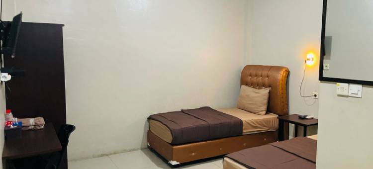 位于Tungkal Iv Kota的2卧室-800平方米|带1个独立浴室(Family Hotel Kuala Tungkal)图片