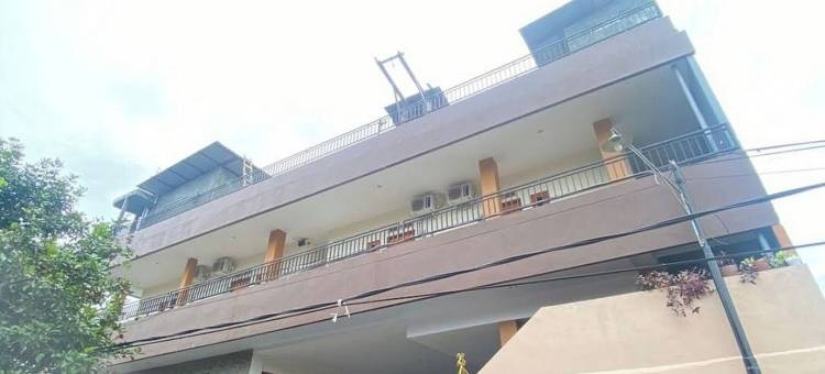 Hotel O 靠近SD GMIM Wiau Lapi的努山塔拉膳宿公寓(Hotel O Wisma Nusantara Near SD Gmim Wiau Lapi)图片