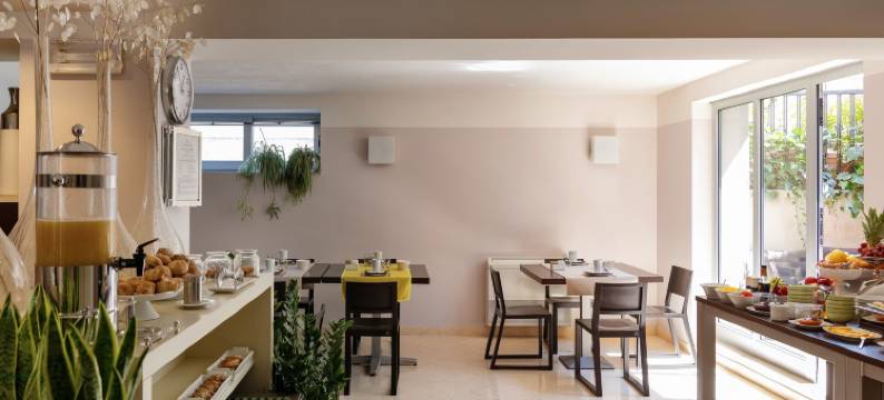 维罗马多西客房和公寓旅馆(Vialeromadodici Rooms & Apartments)图片