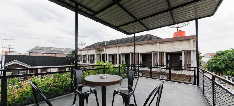 红多兹伊斯兰酒店-近占碑图古朱安(RedDoorz Syariah Near Tugu Juang Jambi)图片