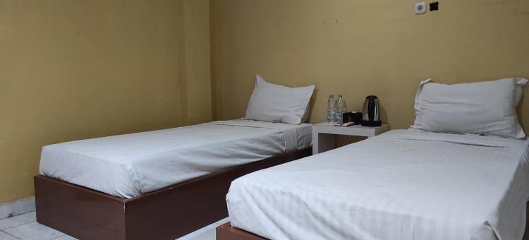 OYO 93411教法酒店托博朗(OYO 93411 Syariah Hotel Tomborang)图片