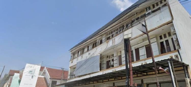 位于茉莉芬的4卧室-600平方米|带1个独立浴室(De Kost Madiun)图片