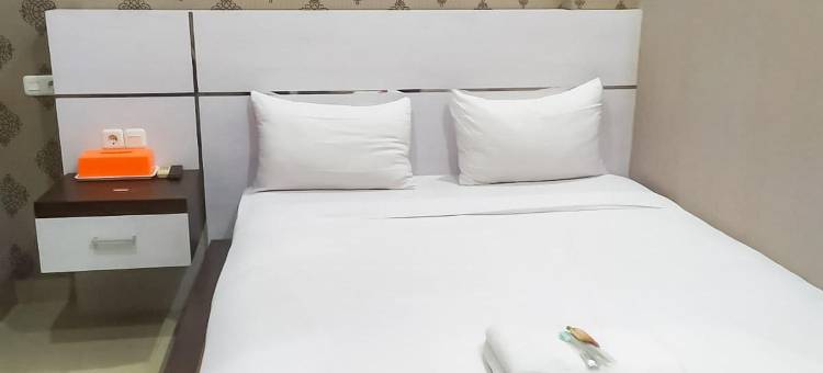 OYO1539阿姆里客房酒店(RedDoorz Syariah Near Sultan Syarif Kasim II Airport)图片