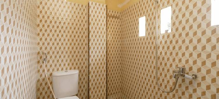 红门酒店Syariah尼尔斯塔修恩克雷塔阿皮基萨兰(RedDoorz Syariah Near Stasiun Kereta Api Kisaran)图片