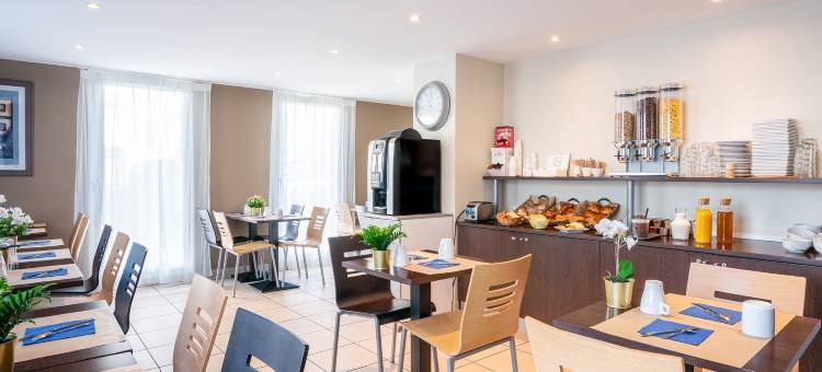 塞祖尔阿菲尔卡昂克洛斯宝姆阿酒店(Séjours & Affaires Caen le Clos Beaumois)图片