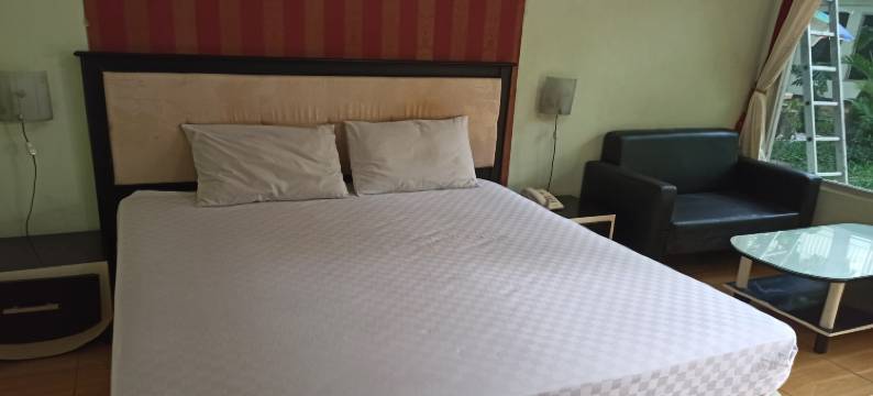 OYO 酒店阿尔阿沙尔旅馆靠近阿西尔乌拜小吃店(Hotel O Penginapan Al-AsharNearWarung Acil Ubai)图片