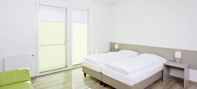 GmbH冈特拉姆斯多尔夫好客房旅馆(Good Rooms Gmbh Guntramsdorf)图片