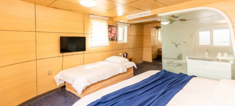 小石岛日落民宿(锦州路分店)图片