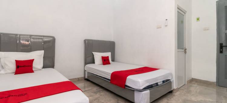 红多兹酒店-近楠榜白沙瓦兰图古科克拉特(RedDoorz Near Tugu Coklat Pesawaran Lampung)图片