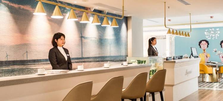 白玉兰酒店(启东滨海工业园店)图片