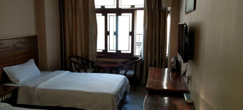 罗山军威快捷宾馆图片