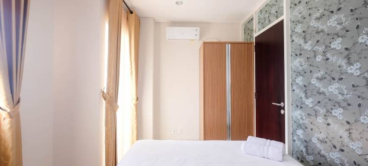 在Atlanta Residences的温暖如家的1卧室公寓，由Travelio提供(Warm and Homey 1Br Apartment at Atlanta Residences by Travelio)图片