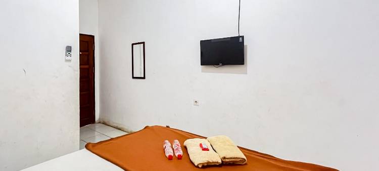 OYO 92626 Dcos Syariah的好眠4旅馆(Good Sleep 4 RedPartner)图片