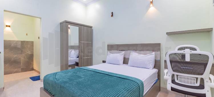 希瓦家园沙利亚红伙伴靠近阿伦阿伦特加尔(Shiva Home Syariah RedPartner Near Alun Alun Tegal)图片