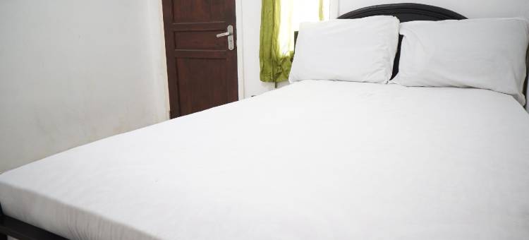 O酒店 Aero Kost Bu Lisa 伊斯兰旅馆，靠近传统市场Lawang(Hotel O Aero Kost Bu Lisa Syariah Near Pasar Tradisional Lawang)图片