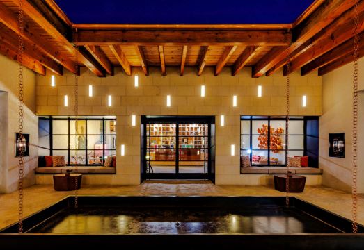 Texican Court, by Valencia Hotel Collection Hotel Overview