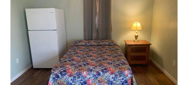 OYO东斯特劳兹堡波科诺斯的Werry's小屋汽车旅馆酒吧(Werry's Cottages Motel & Pub by OYO East Stroudsburg Poconos)图片