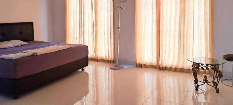 哥打莫巴古家庭穆斯林红多兹民宿(RedDoorz @ Family Syariah Homestay Kotamobagu)图片