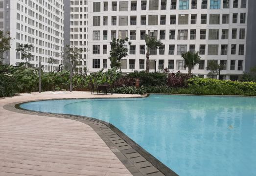 Comfy Studio Apartment with Extra Bed at M-Town Residence Hotel Overview