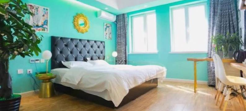 轻住酒店·果然精品(乐松机场巴士凯旋广场店)图片