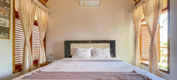 库塔海滩曼达利卡附近的艾拉民宿 - 红门酒店集团(Aira Homestay Near Pantai Kuta Mandalika Mitra RedDoorz)图片