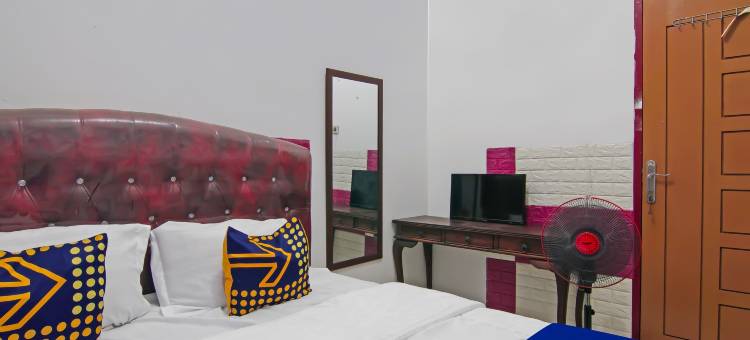 O酒店普特里伊斯兰旅馆靠近SPBU林博潘长(Hotel O Putri Guest House Syariah Near Spbu Rimbo Panjang)图片