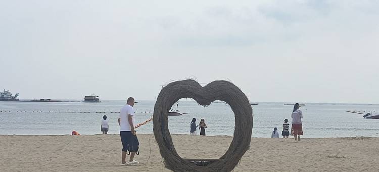 距离高铁韩乐坊香海东浦湾海边公寓(河海路分店)图片