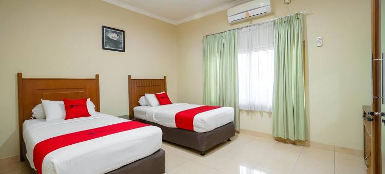 红多兹酒店@林塔斯苏门答腊拉哈特路(RedDoorz @ Jalan Lintas Sumatera Lahat)图片