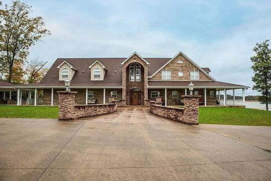 "LAKE HOUSE" On 7 Acres Of Douglas Lake With A Private Boat Ramp & Private Dock!