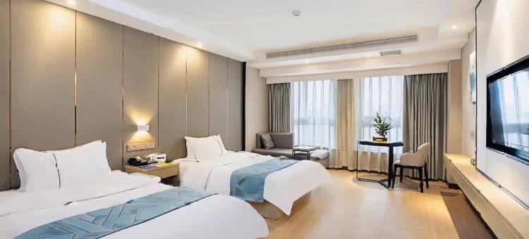 月伴湾商务酒店(长葛市政府葛天源轻轨站店)图片