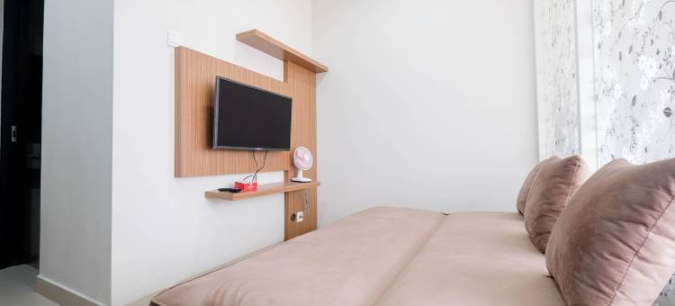 在Atlanta Residences的温暖如家的1卧室公寓，由Travelio提供(Warm and Homey 1Br Apartment at Atlanta Residences by Travelio)图片