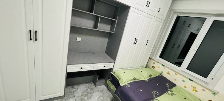 万兴公寓万达附近空调大床房技师学院(万达路分店)图片