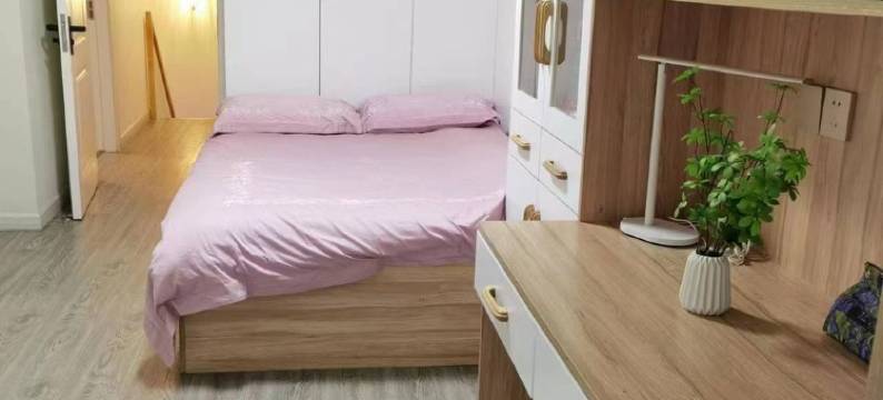 麦肯提轻居民宿(龙城南街分店)图片