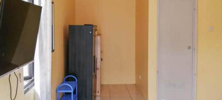 里斯奇亚清真TOD M1苏加诺哈达机场米特拉红门酒店(Risqia Syariah Tod M1 Bandara Soekarno Hatta Mitra RedDoorz)图片