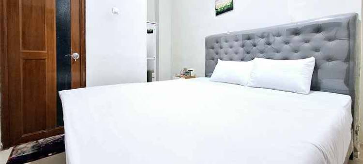 卡里斯玛努山塔拉萨甘米特拉红门酒店(Kharisma Nusantara Homestay Sagan Mitra RedDoorz)图片