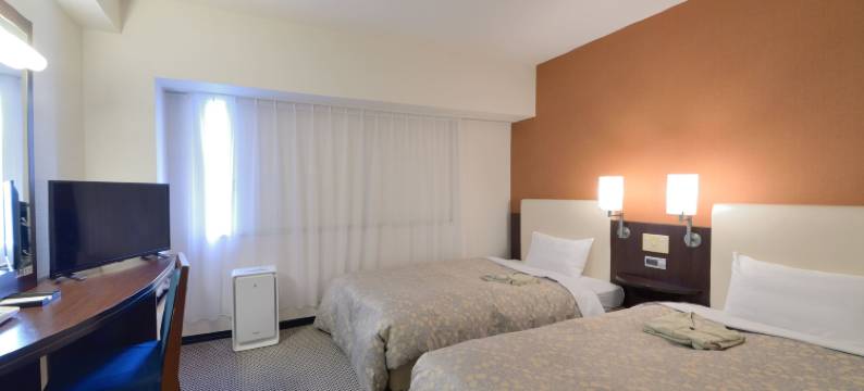 高冈曼藤伊可玛酒店(Takaoka Manten Hotel Ekimae)图片