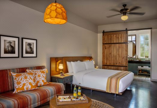 Texican Court, by Valencia Hotel Collection Hotel Overview